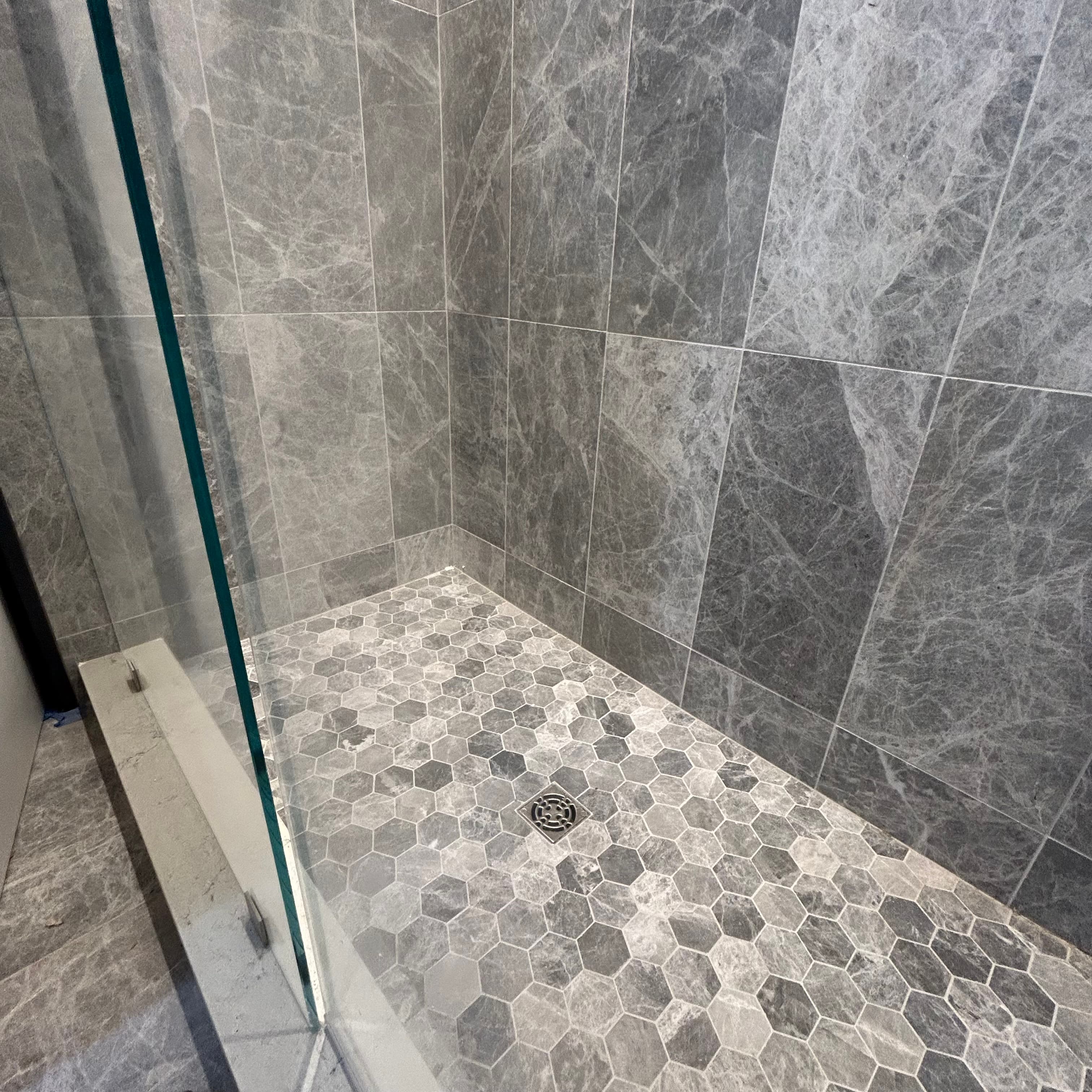 Image inside a large marble shower